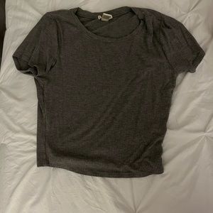 Grey t-shirt.